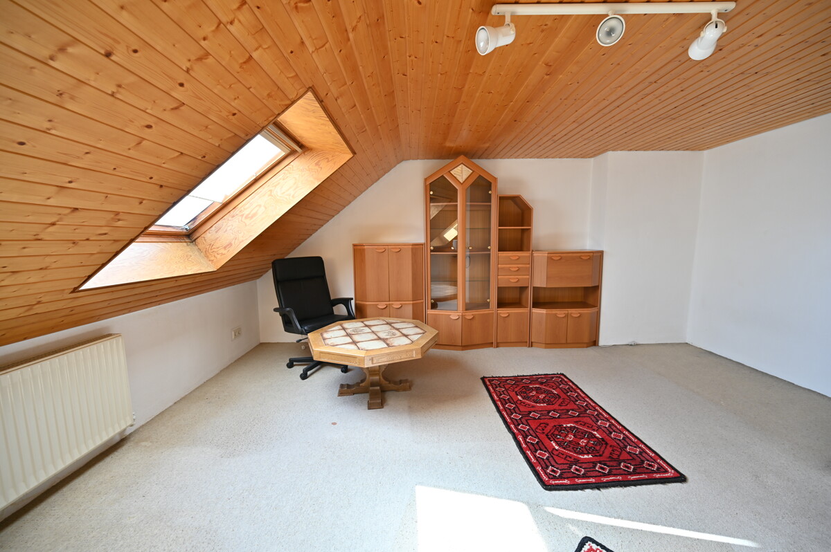 Zimmer im Dachgeschoss - Melverode – Reihenmittelhaus mit Südgarten und Garage